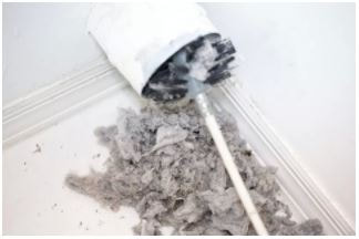 Removing build up of lint and dirt from dryer vent with rotating brush